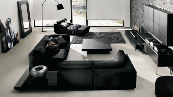 корпусная мебель черного цвета в дизайне гостиной